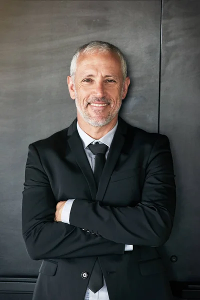 Stock image Business man, happy and portrait with a smile and arms crossed in studio. A confident senior entrepreneur or executive person on a grey wall with corporate clothes, positive mindset and career pride.