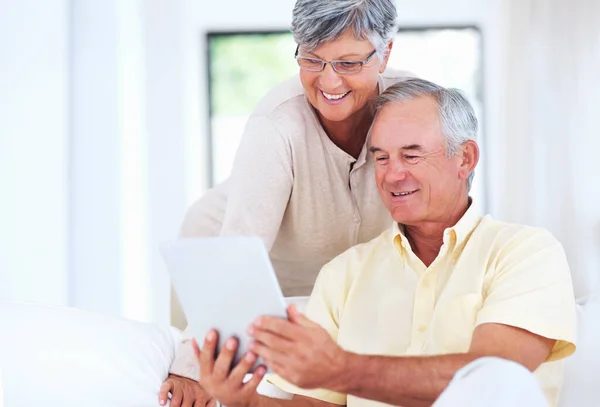 Couple Using Digital Tablet Home Cheerful Mature Couple Smiling While — Stock Photo, Image
