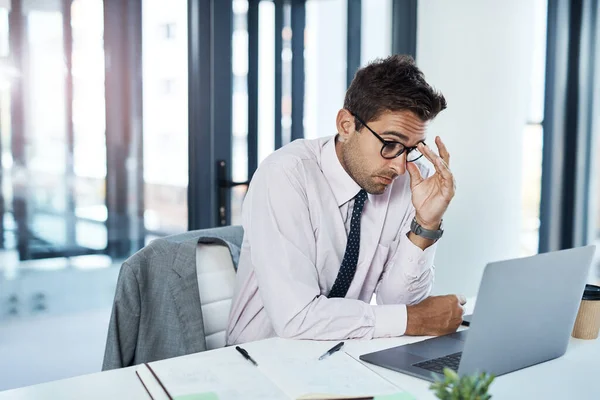 stock image Headache, anxiety and man on laptop in office frustrated with glitch, mistake or crisis. Stress, burnout and male business person angry with fail, 404 or bad review, deadline report or tech delay.