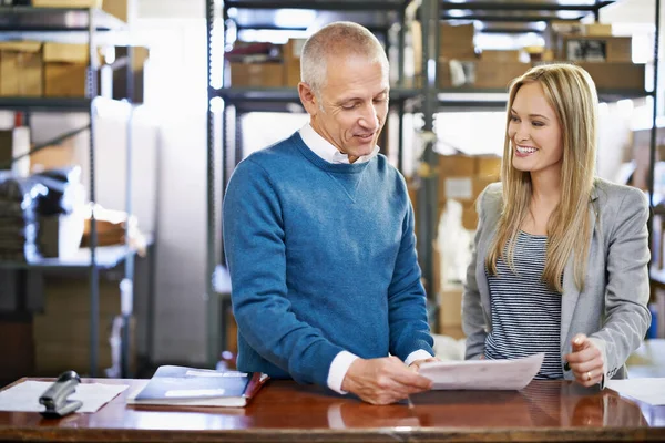 Tracking Deliveries Old Fashioned Way Two Managers Looking Paperwork Warehouse — Stock Photo, Image