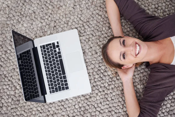 Connected Anywhere Anytime High Angle Shot Young Woman Lying Floor — Stock Photo, Image
