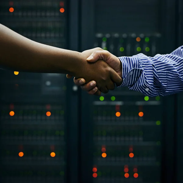 stock image Handshake, partnership or people in server room of data center worker for network help with IT support. B2b deal agreement, teamwork closeup or successful men shaking hands together in collaboration.