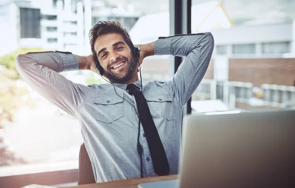 stock image Businessman, relax and portrait smile in call center for customer service, support or telemarketing break at office. Happy man person, consultant or agent smiling and relaxing with hands on head.