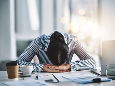 Sleeping, tired and business woman at desk for headache, overworked and stress in office. Exhausted, burnout and mental health with female employee resting for fatigue, dreaming and frustrated. clipart