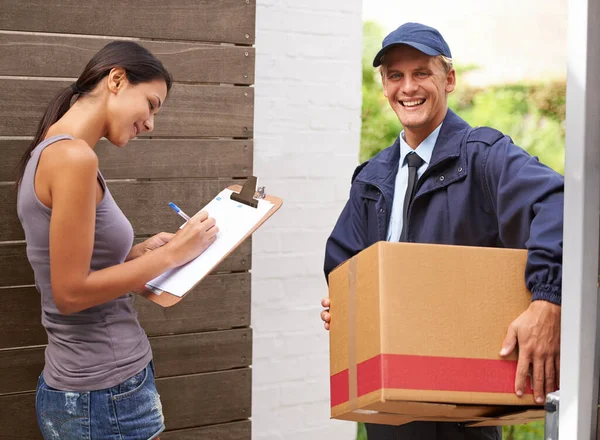 Smile Delivery Woman Signing Package Using Pen Postman Logistics Courier — Stock Photo, Image