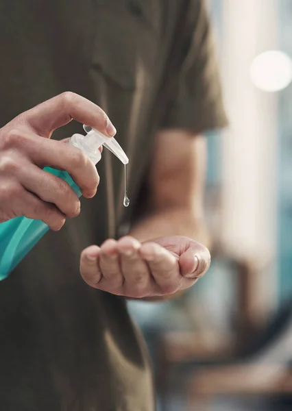 Safer Tomorrow Starts You Unrecognisable Man Disinfecting His Hands Sanitiser — Stock Photo, Image