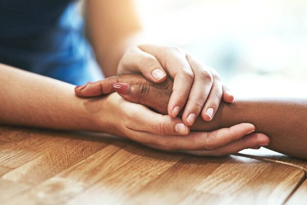 Support, love and diversity with people holding hands for hope, trust and empathy. Faith, forgive and friends with a helping hand, respect and help through grief or consoling with connection.