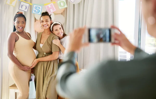 stock image These are the people who matter. a group of women taking photos at their friends baby shower