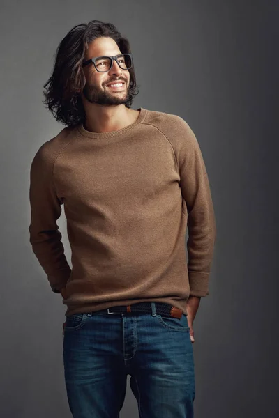 stock image Look on the bright side of life. Studio shot of a handsome young man posing against a gray background