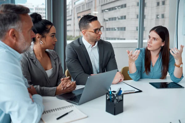 Team, laptop and discussion planning strategy for ecommerce finance, target goals and startup sales in office. Business people, leader communication and teamwork or tech data management conversation.