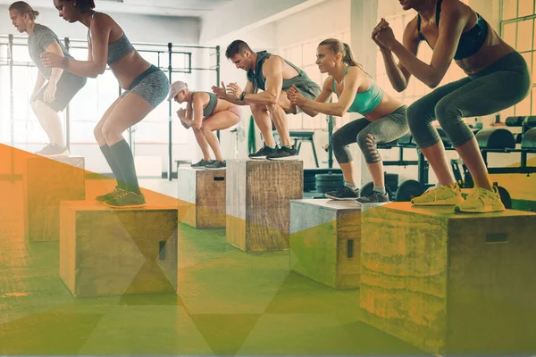 Box jump, fitness and exercise with people at gym for workout and cross training. Athlete men and women group together for power challenge, commitment and strong muscle in class or club with overlay.