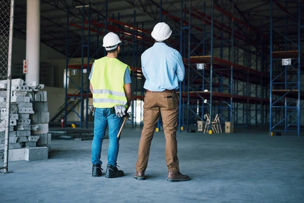 Match Made Engineering Having Two Builders Inspecting Construction Site — Stock Photo, Image