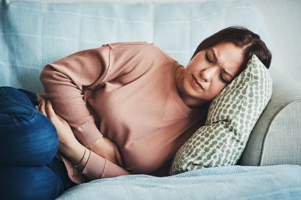 Stomach Ache Pain Woman Home Sofa Menstrual Period Cramps Lounge — Stock Photo, Image