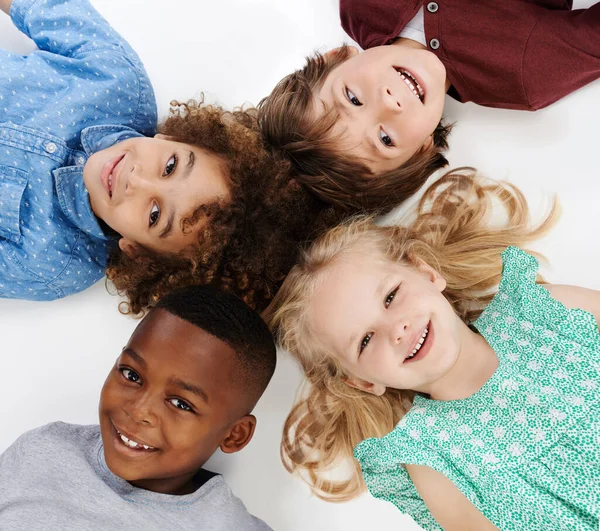 Circle Friends Studio Shot Group Young Friends Lying Floor Together — Stock Photo, Image