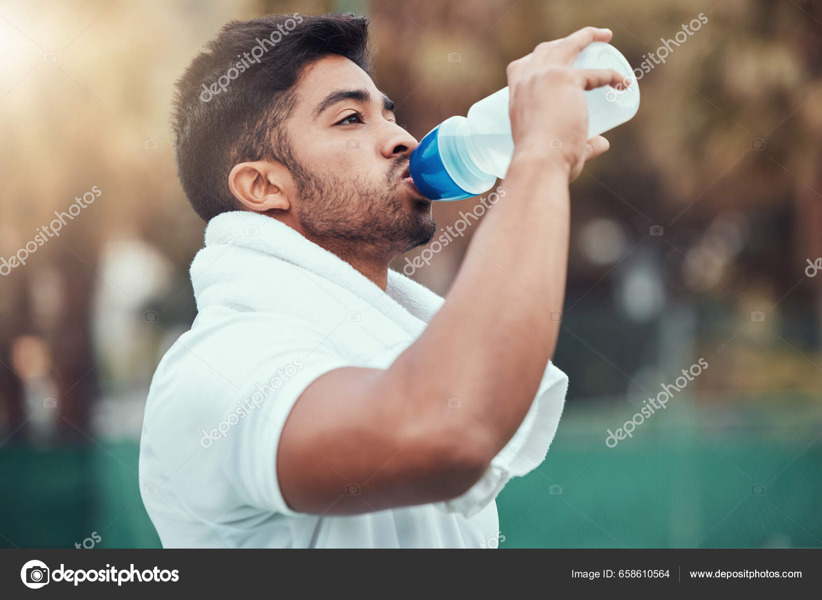 Man Fitness Drinking Water Tennis Court Workout Match Game Practice Stock  Photo by ©PeopleImages.com 658610564