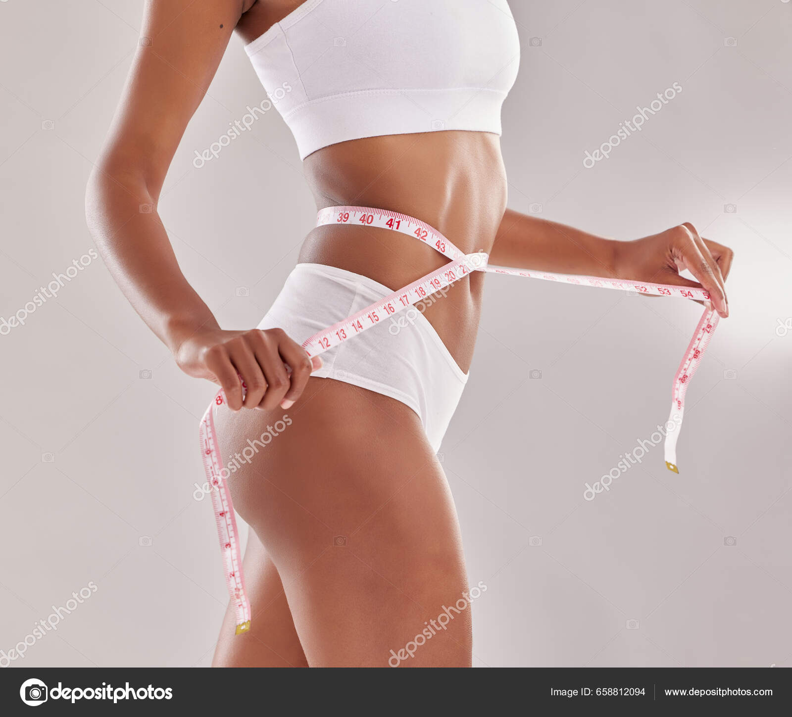 https://st5.depositphotos.com/62628780/65881/i/1600/depositphotos_658812094-stock-photo-woman-underwear-body-measuring-tape.jpg