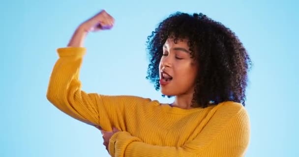 Wink Arm Bicep Black Woman Joking Studio Blue Background Fun — Stock Video