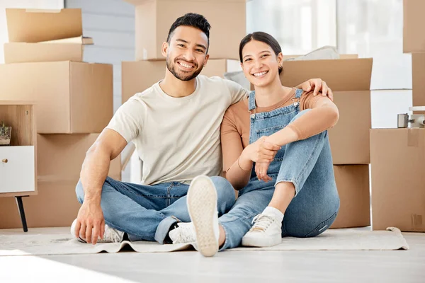 Happy, moving and box with portrait of couple in living room of new home for investment, property or support. Real estate, packing and goal with man and woman in apartment for rent, homeowner or love.