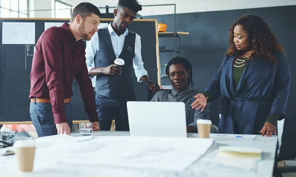 stock image Its time to get creative. a group of creative businesspeople meeting in their office