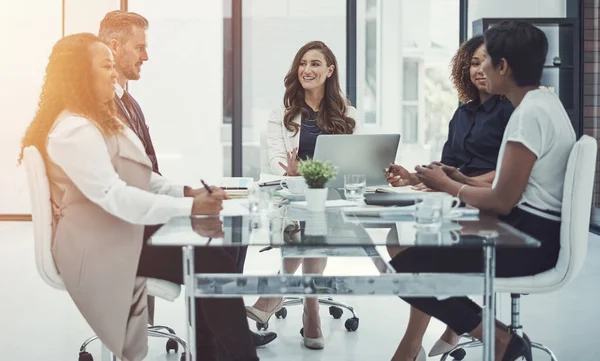 stock image Every meeting maximizes on success. a group of colleagues having a meeting in a modern office