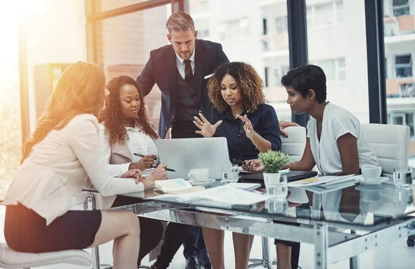 stock image They respect each others contributions. a group of colleagues having a meeting in a modern office