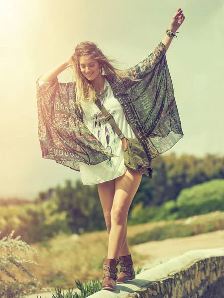 stock image Wherever you go, go with all your heart. a free spirited young woman enjoying the sunshine outside