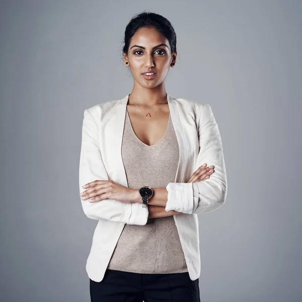 stock image Nothing stands in my way of having a successful career. Studio portrait of a young businesswoman posing against a gray background