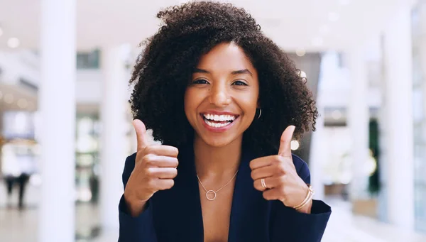 stock image Thumbs up, yes and happy business black woman doing thank you gesture, sign and excited for company success. African, goal and portrait of a corporate or professional employee in agreement with smile.