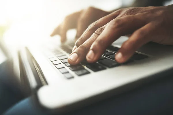 stock image Productivity pulses through his fingertips. an unrecognizable businessman using a laptop