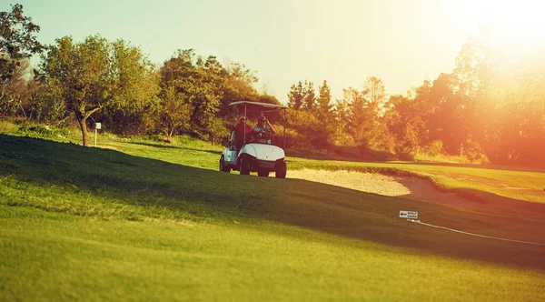 Isnt Got Two Golfers Riding Cart Golf Course — Stock Photo, Image