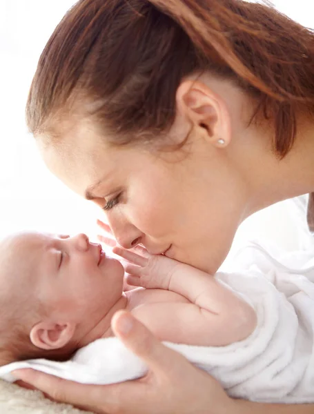 Mother Kiss Newborn Baby Closeup Love Happiness Care Bedroom Family Stock Image
