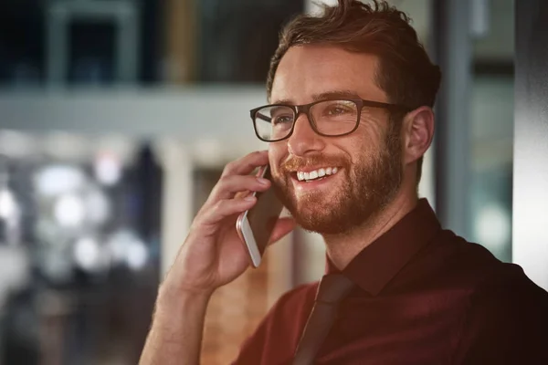 stock image Feel free to call me anytime. a young businessman using a mobile phone in a modern office