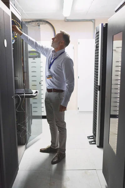 Lets Get Technical Mature Man Working Server Room — Stock Photo, Image