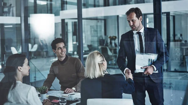 stock image His dream career starts here. two corporate colleagues shaking hands during a meeting in the boardroom