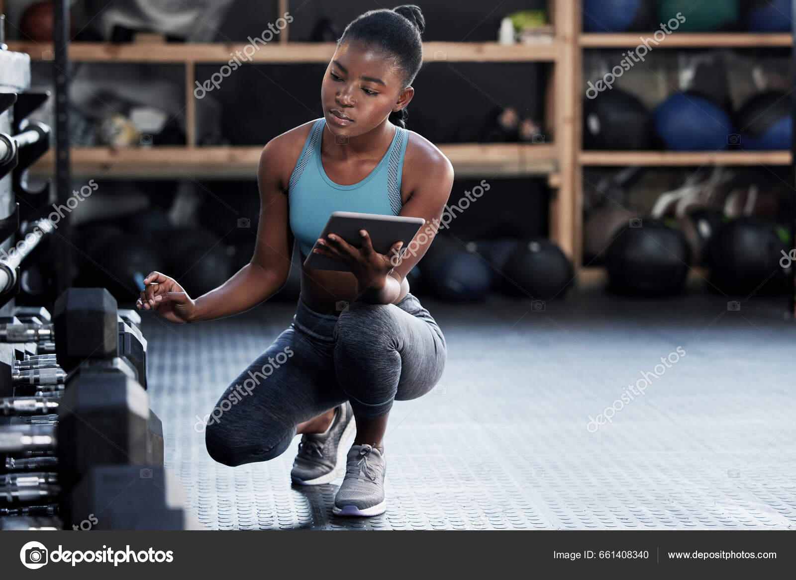 Girl Inspection Personal Trainer Tablet Fitness Training Dumbbells Workout  Tools Stock Photo by ©PeopleImages.com 661408340