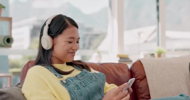 Music Headphones Woman Phone Sofa Home Living Room Streaming Radio — Stock Video