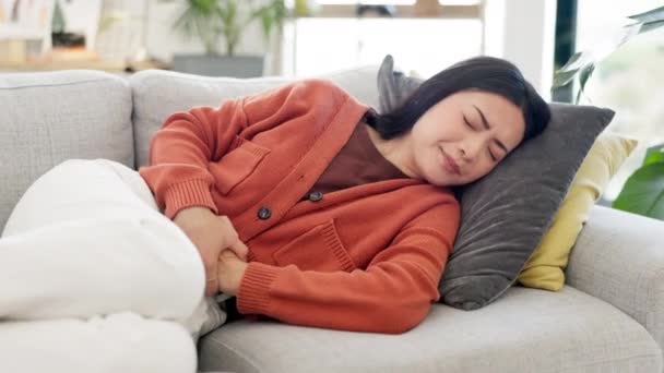 Pain Cramps Asian Woman Couch Stomach Suffering Sickness Illness Constipation — Stock Video