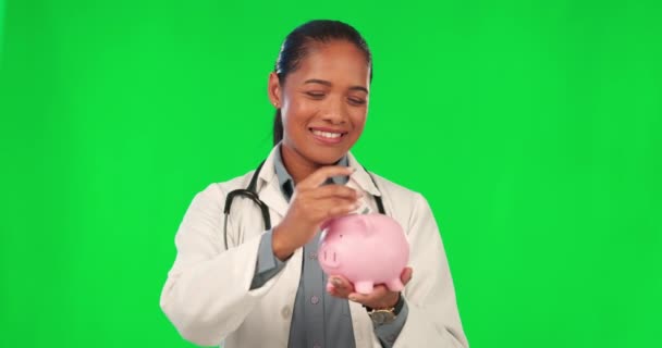 Piggy Τράπεζα Μετρητά Και Γιατρός Στην Πράσινη Οθόνη Για Τις — Αρχείο Βίντεο