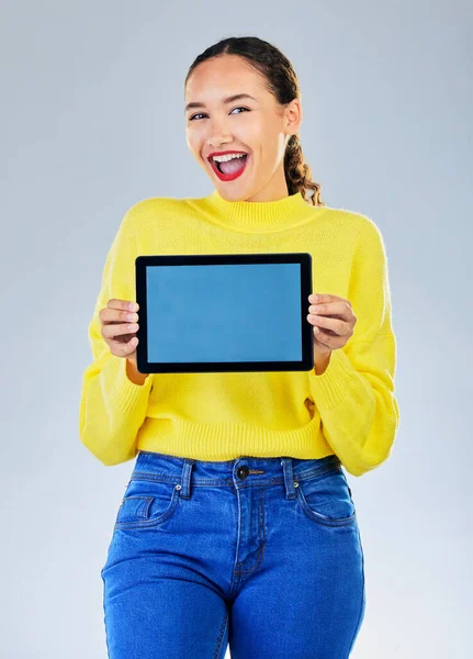 stock image Tablet screen, space and woman or student for university presentation, discount news or e learning information. Portrait of person, digital mockup and college or education wow on studio background.