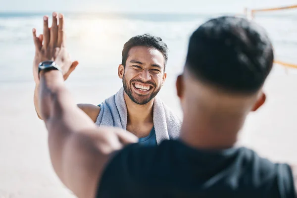 stock image High five, fitness winner and people at beach celebration, success and workout goals or teamwork. Training, exercise and sports men, personal trainer or athlete friends, hands together and support.