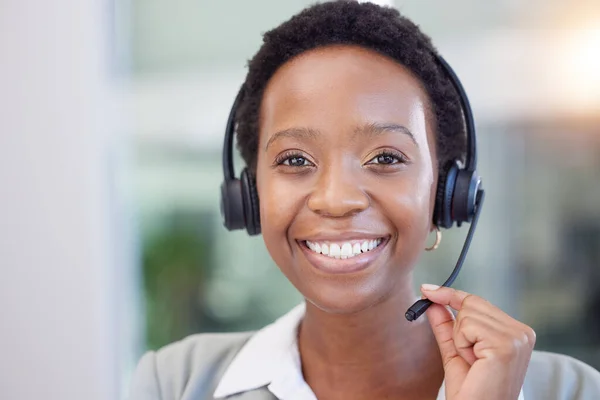 stock image Black woman, telemarketing and smile for communication, customer support or contact in call center for CRM questions. Face, happy receptionist and agent for sales consulting, telecom or advisory help.