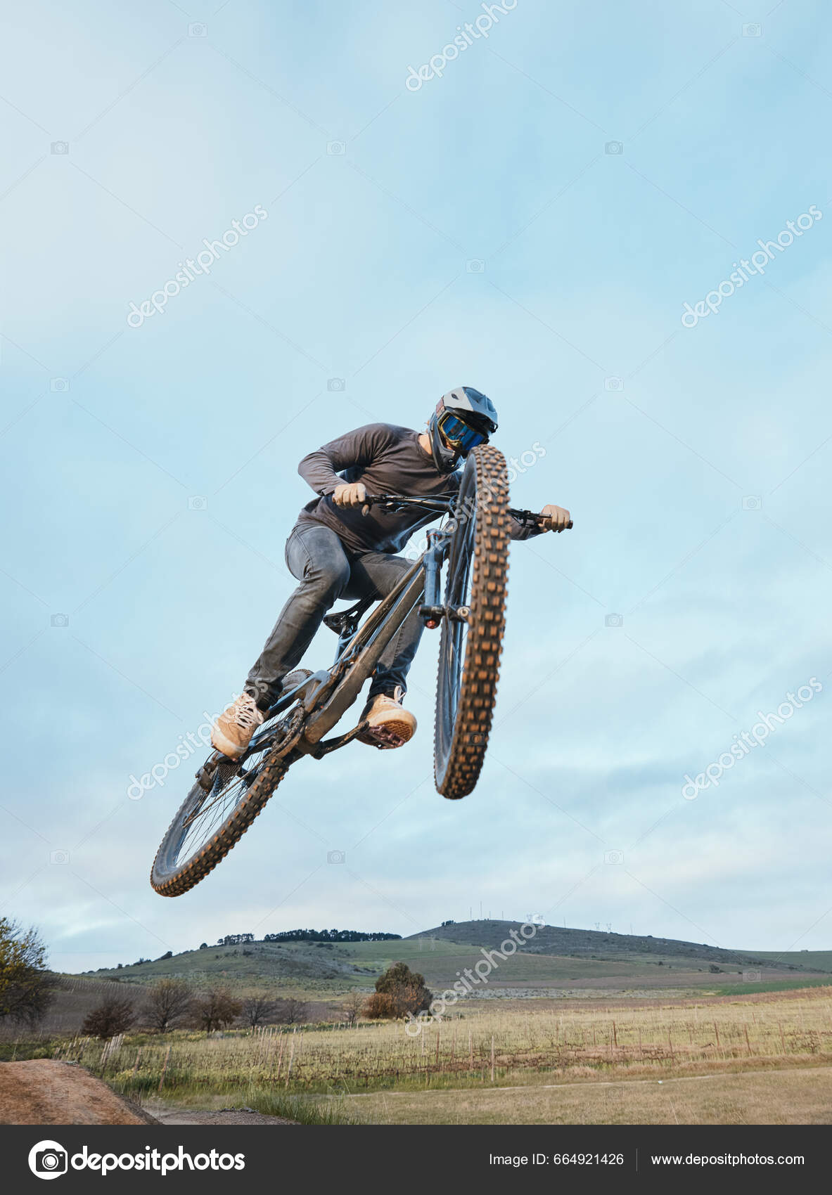 Cycling Fitness Man Bicycle Jump Extreme Sports Energy Adrenaline Nature  Stock Photo by ©PeopleImages.com 664921426