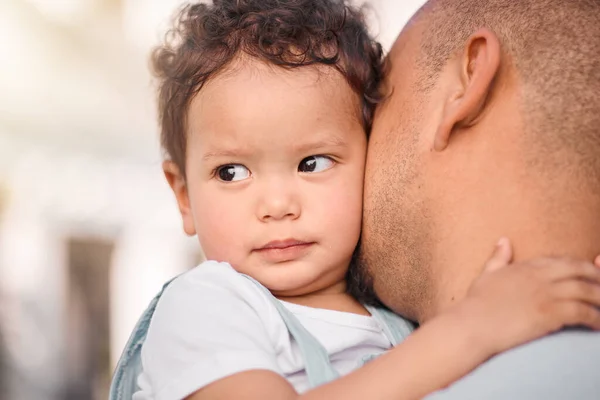 stock image Love, dad and child hug, family bonding with support and trust in safety of parents embrace. Security, future hope and father holding baby outside, hugging and spending safe quality time together