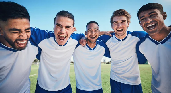 stock image Football player, game and portrait of men together on a field for sports and fitness. Happy male soccer team or athlete group for challenge, competition or motivation for training outdoor on a pitch.