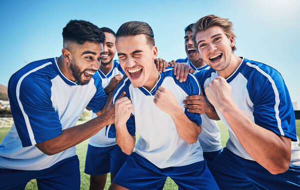 Football player, game and men celebrate together on a field for sports and fitness win. Happy male soccer team or athlete group with fist for challenge, competition or achievement outdoor on pitch.