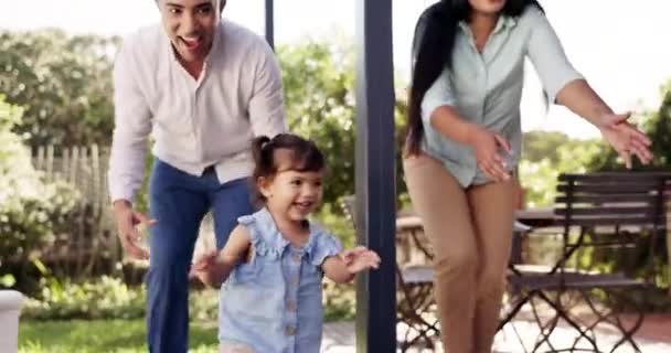 Happy Child Girl Running Parents Outdoor Garden Backyard Toddler Laughing — стоковое видео