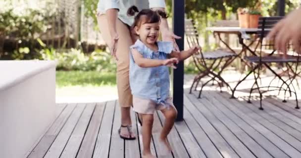 Happy Girl Child Learning Walk Dance Parents Outdoor Garden Backyard — Vídeo de Stock