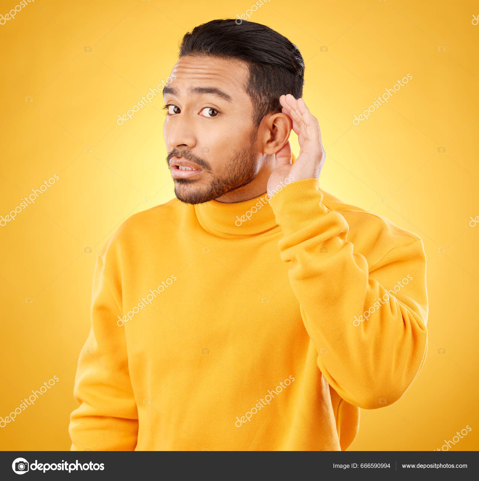Man with yellow paint on his face hi-res stock photography and