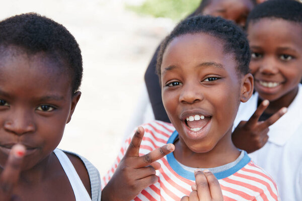 All we want is love and peace. Shot of kids at a community outreach event