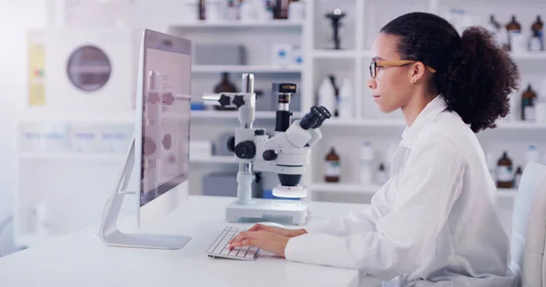 Computer, science and research with woman in laboratory for future, pharmacy and medical. Healthcare, technology and study analysis with female scientist for medicine, expert and online report.